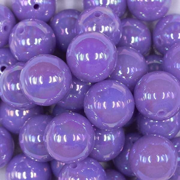 Close up view of a pile of 20MM Light Purple Neon AB Solid Chunky Bubblegum Beads