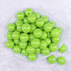 Top view of a pile of 20MM Lime Green Neon AB Solid Chunky Bubblegum Beads