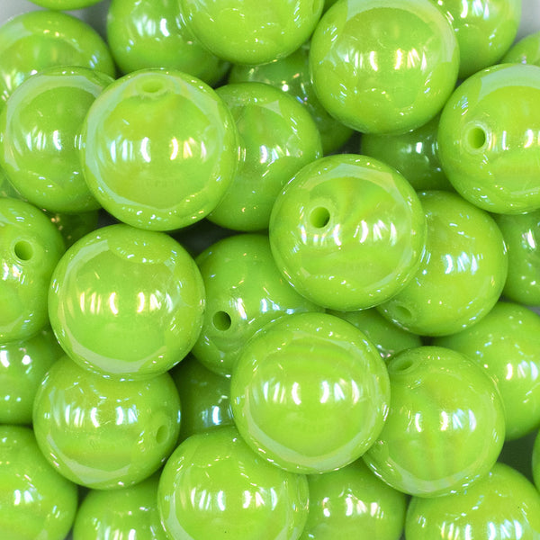 Close up view of a pile of 20MM Lime Green Neon AB Solid Chunky Bubblegum Beads