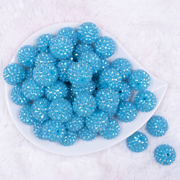 top view of a pile of 20mm Neon Blue Rhinestone AB Bubblegum Beads