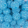 Close up view of a pile of 20mm Neon Blue Rhinestone AB Bubblegum Beads