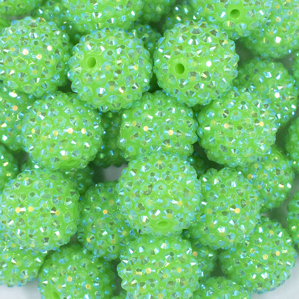 close up view of a pile of front view of a pile of 20mm Neon Blue Rhinestone AB Bubblegum Beads