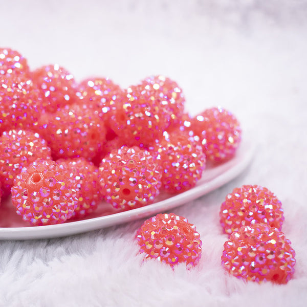 Front view of a pile of 20mm Neon Pink Rhinestone AB Bubblegum Beads