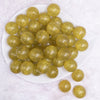 top view of a  pile of 20mm Olive Yellow Glitter Sparkle Chunky Acrylic Bubblegum Beads