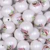 Close up view of a pile of 20mm One In A Melon Print on Matte White Acrylic Bubblegum Beads