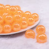 front view of a pile of 20mm Orange Jelly AB Acrylic Chunky Bubblegum Beads