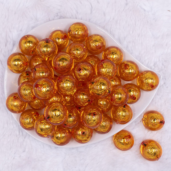 top view of a pile of 20mm Orange Foil Bubblegum Beads
