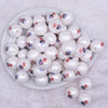 Top view of a pile of 20mm Patriotic Pineapple print on Matte White Chunky Acrylic Bubblegum Beads jewelry