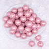top view of a pile of 20mm Pink with Gold Mermaid Scales Print Bubblegum Beads