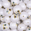 Close up view of a pile of 20mm Marijauna Leaf Love Print on Matte White Acrylic Bubblegum Beads