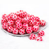 front view of a pile of 20mm Red Multiple Hearts with Matte White Acrylic Bubblegum Beads