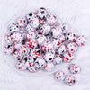top view of a pile of 20mm Black & Red Splatter on White Chunky Acrylic Bubblegum Beads