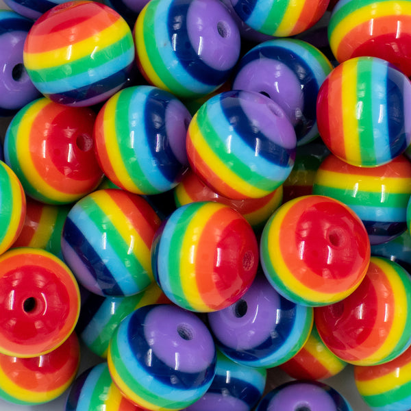 Close up view of a pile of 20mm Rainbow Stripes Bubblegum Beads