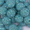 Close up view of a pile of 20mm Teal Rhinestone AB Bubblegum Beads