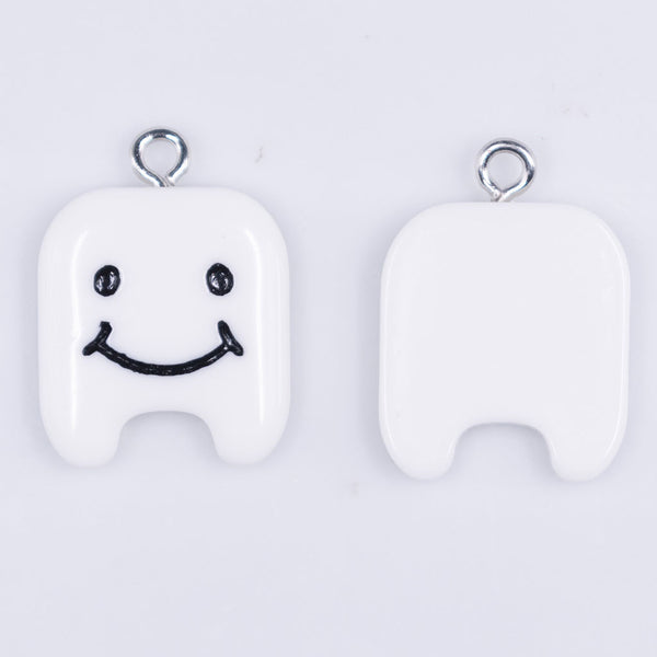 top view of a White Tooth Resin charm 17x19mm