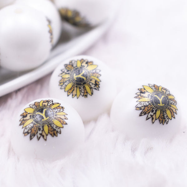 macro view of a Pile of 20mm Sunflower with Yellowstone Y print on Matte White Chunky Acrylic Bubblegum Beads Jewelry