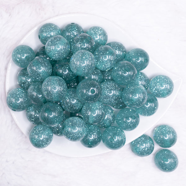 top view of a pile of 20mm Aqua Blue Glitter Sparkle Bubblegum Beads