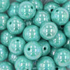 Close up view of a pile of 20MM Aquamarine AB Solid Chunky Bubblegum Beads