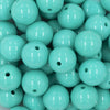 Close up view of a pile of 20mm Aquamarine Solid Chunky Acrylic Bubblegum Beads