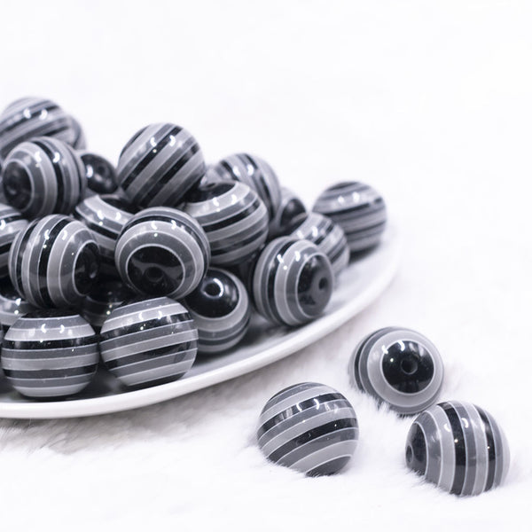Front view of a pile of 20mm Black, Gray and White Stripes Chunky Bubblegum Jewelry Beads