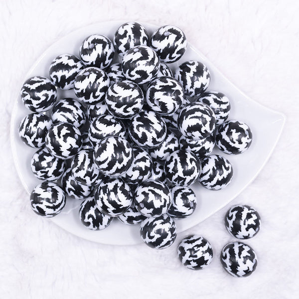 Top view of a pile of 20mm Black & White Animal Print Bubblegum Beads
