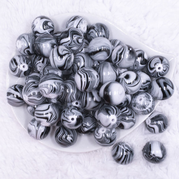 top view of a pile of 20mm Black Marbled Bubblegum Beads