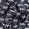 Close up view of a pile of 20mm Black with Silver Pin Stripes Acrylic Bubblegum Beads