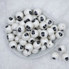 Top view of a pile of 20mm Black Skull Print Chunky Acrylic Bubblegum Beads [10 Count]