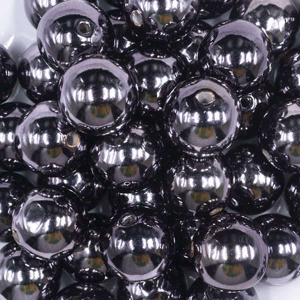 Close up view of a pile of 20mm Reflective Black Acrylic Bubblegum Beads