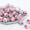 Front view of a pile of 20mm Red Splatter [NO AB] Chunky Acrylic Bubblegum Beads