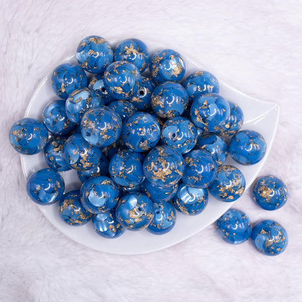 top view of a pile of 20mm Blue and Gold Flake Resin Chunky Bubblegum Beads