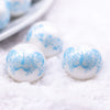 Macro view of 20mm Blue Butterfly pattern on white matte chunky acrylic Bubblegum Beads