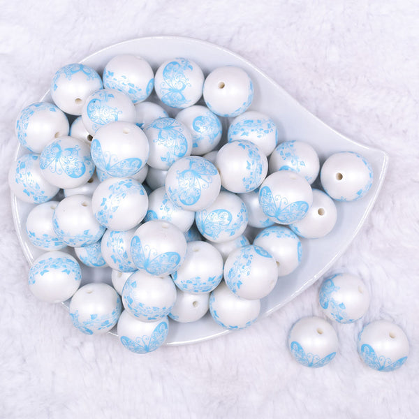 Top view of 20mm Blue Butterfly pattern on white matte chunky acrylic Bubblegum Beads