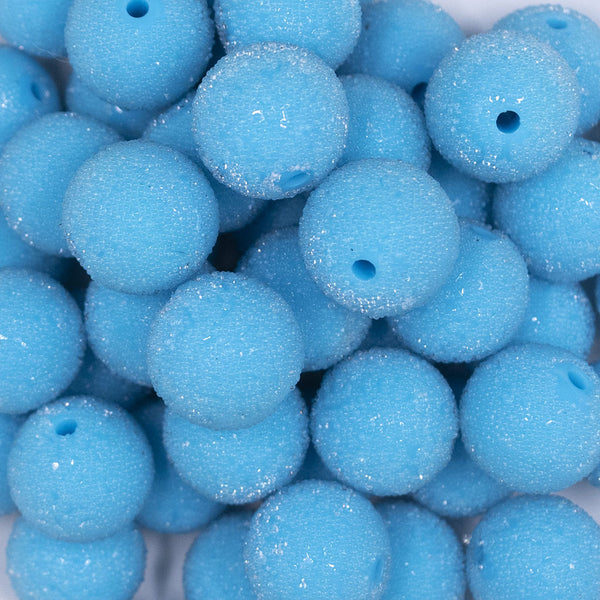 Close up view of a pile of 20mm Blue Sugar Glass Bubblegum Beads