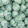Close up view of a pile of 20mm Green with Blue Swirl Pattern Chunky Acrylic Bubblegum Beads