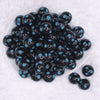 top view of a pile of 20mm Blue Polka Dots on Black Bubblegum Beads