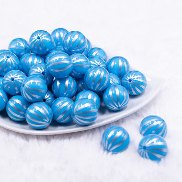 Front view of a pile of 20mm Blue with Silver Pin Stripes Acrylic Bubblegum Beads