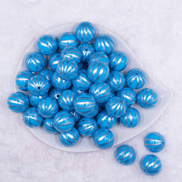 Top view of a pile of 20mm Blue with Silver Pin Stripes Acrylic Bubblegum Beads