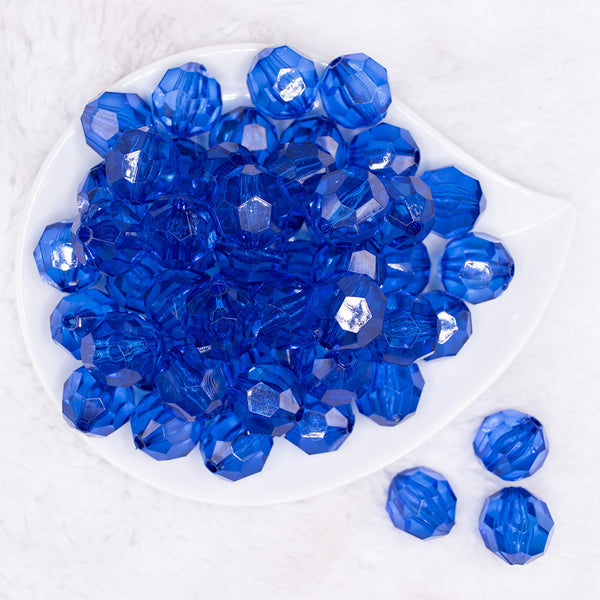 Top view of a pile of 20mm Blue Transparent Faceted Bubblegum Beads