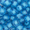 Close up view of a pile of 20mm Blue Transparent Pumpkin Shaped Bubblegum Bead