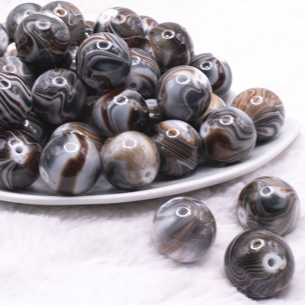 front view of a pile of 20mm Brown/Black Marbled Bubblegum Beads