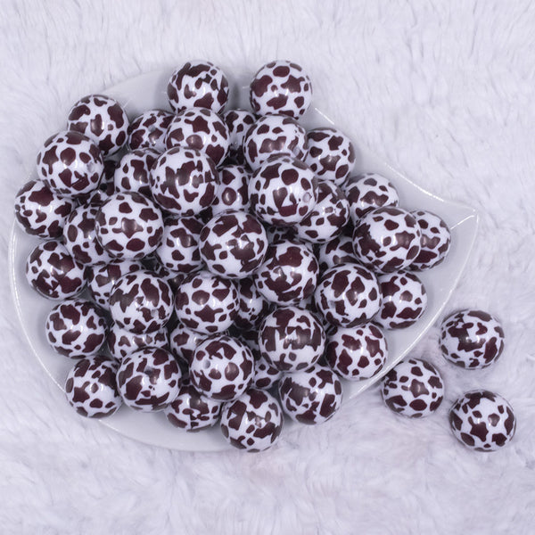 top view of a pile of 20mm White and Brown Cow Print Bubblegum Beads