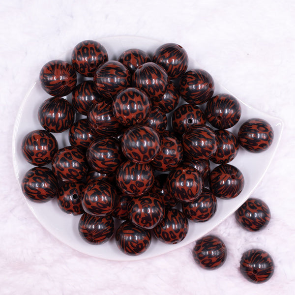 Top view of a pile of 20mm Brown and Black Leopard Animal Print Acrylic Bubblegum Beads
