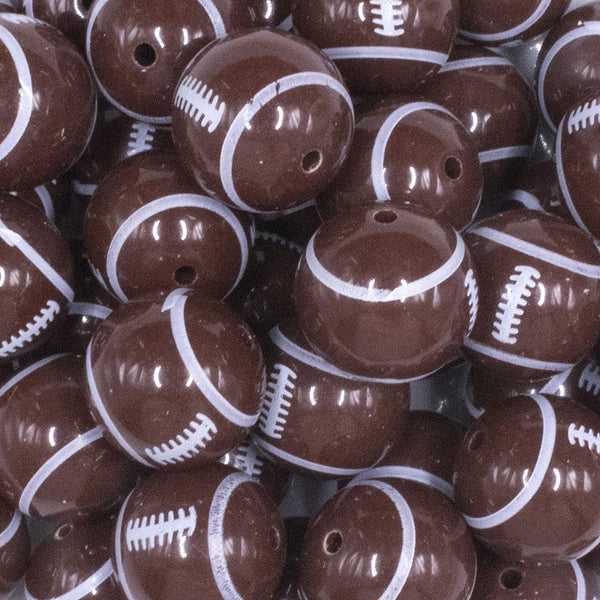 close up view of a pile of 20mm Sports Football Chunky Acrylic Bubblegum Beads