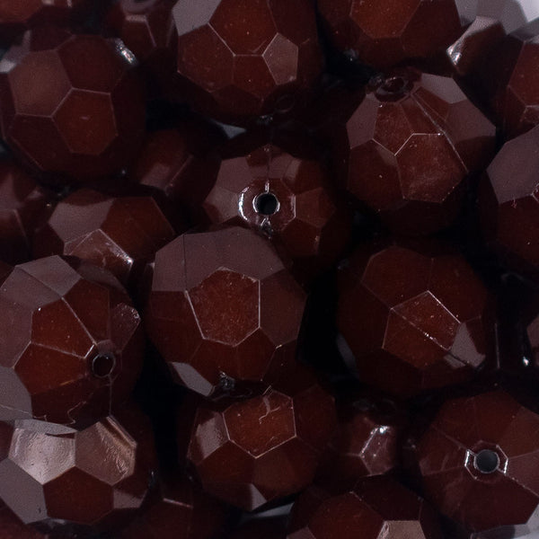 Close up view of a pile of 20mm Brown Faceted Opaque Bubblegum Beads