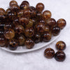 Front view of a pile of 20mm Brown Crackle Leopard Animal Print Acrylic Bubblegum Beads
