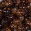close up view of a pile of 20mm Brown Crackle Leopard Animal Print Acrylic Bubblegum Beads