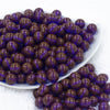 Front view of a pile of 12mm Brown with Purple Illuminating Core Glow Chunky Bubblegum Beads