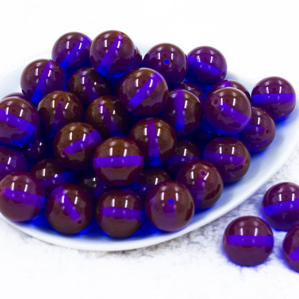 Front view of a pile of 20mm Brown with Purple Illuminating Core Glow Chunky Bubblegum Beads