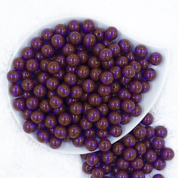 Top view of a pile of 12mm Brown with Purple Illuminating Core Glow Chunky Bubblegum Beads